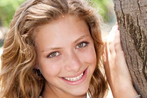 Image of Closeup portrait of a happy young beautiful woman
